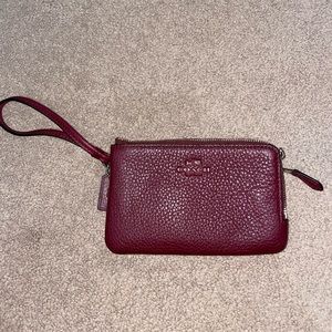 Burgundy coach wristlet